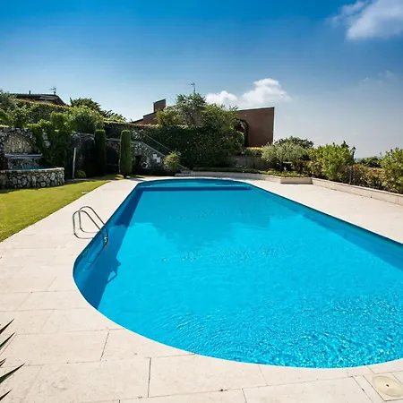 Red With Shared Pool And Private Garden Is The New Black On Garda Villa