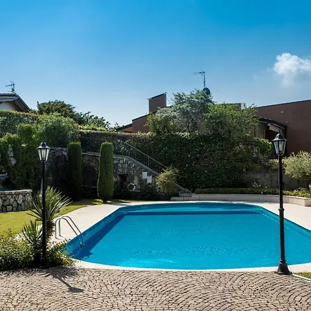 Red With Shared Pool And Private Garden Is The New Black On Garda Villa